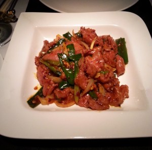 Lamb with chilli oil and spring onion Royal China, Mumbai